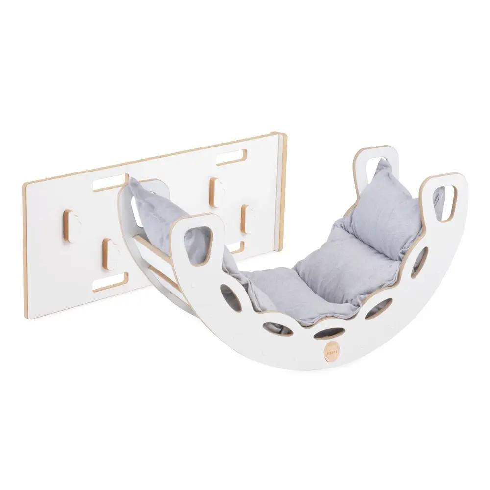 Bascule 4 en 1 - bois blanc, avec mur d’escalade, toboggan et coussin en velours gris clair, motricité - Plush nest by Misioo