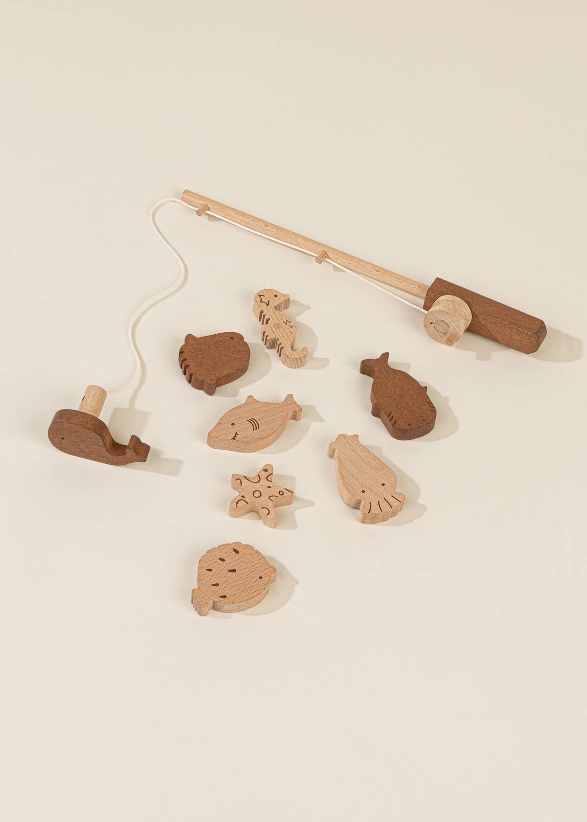 Jeu de pêche en bois avec sac  Coco Village Jeu de pêche en bois avec sac myplayground