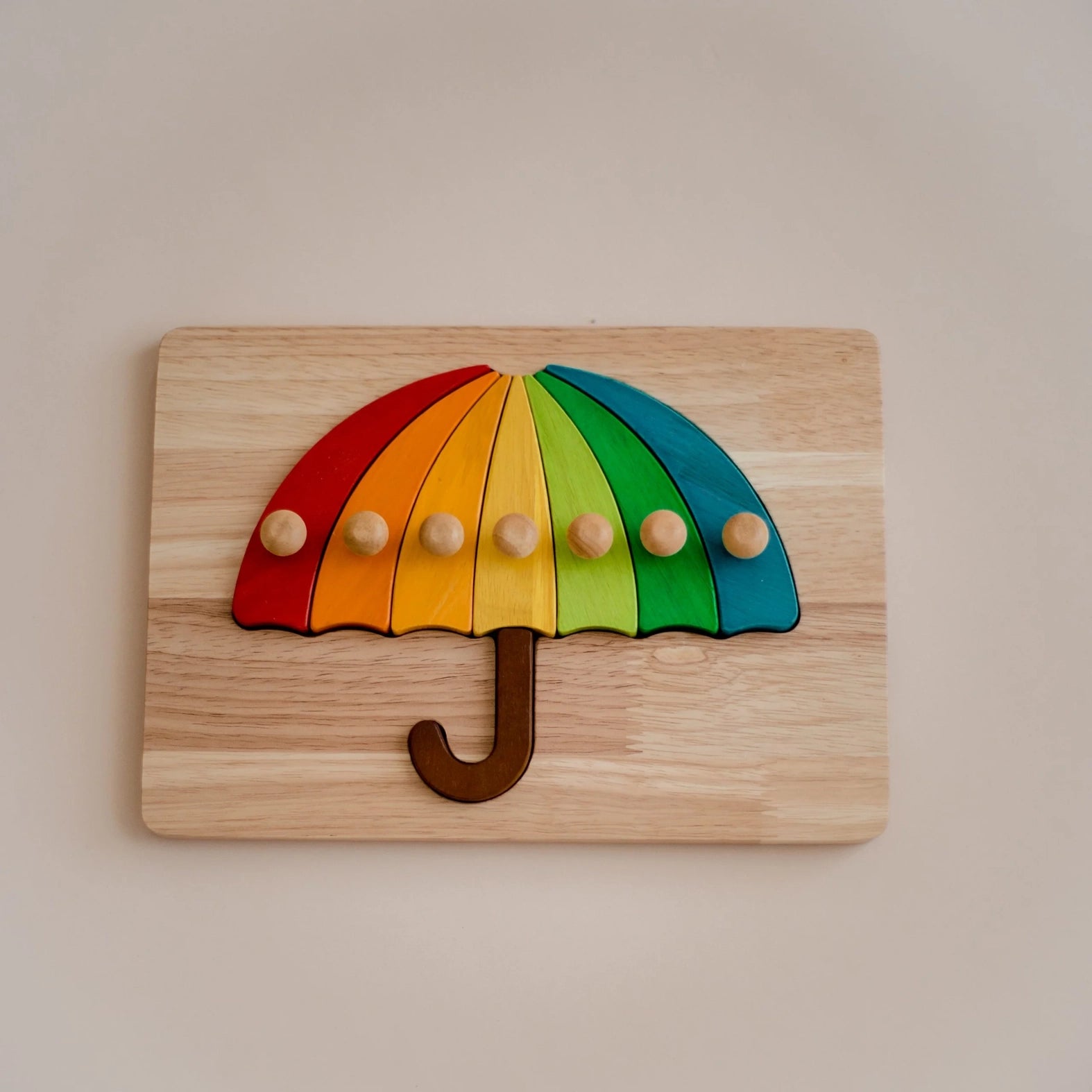 Puzzle de parapluies coloré  QToys USA Puzzle de parapluies coloré myplayground