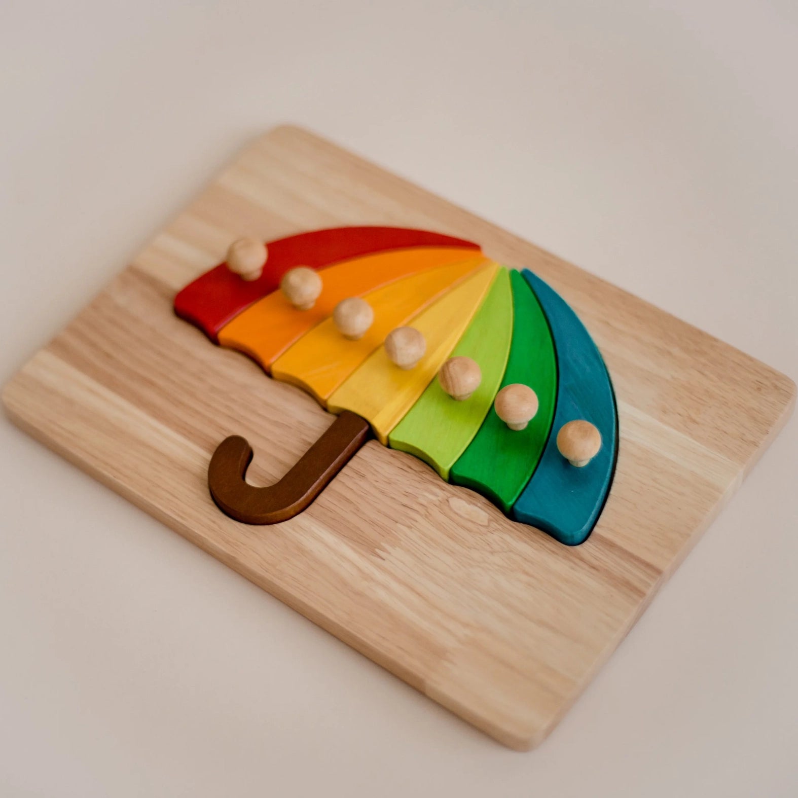 Puzzle de parapluies coloré  QToys USA Puzzle de parapluies coloré myplayground